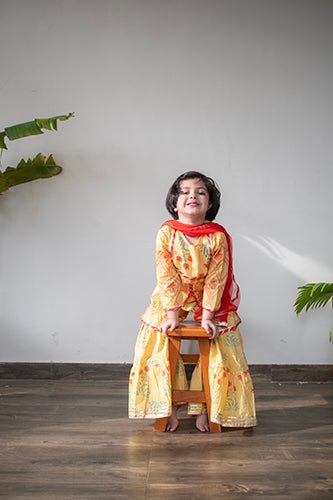 Girls Yellow Floral Yoke Kurti With Yellow Floral Sharara And Dupatta