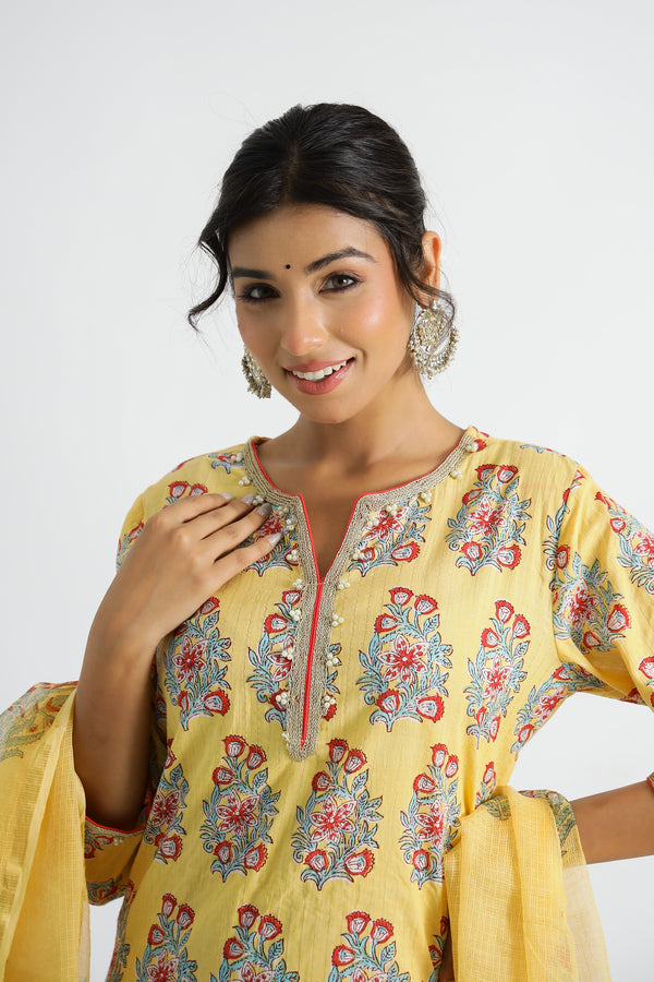 Woman Yellow Buta Kurti With Yellow Floral Salwar And Dupatta