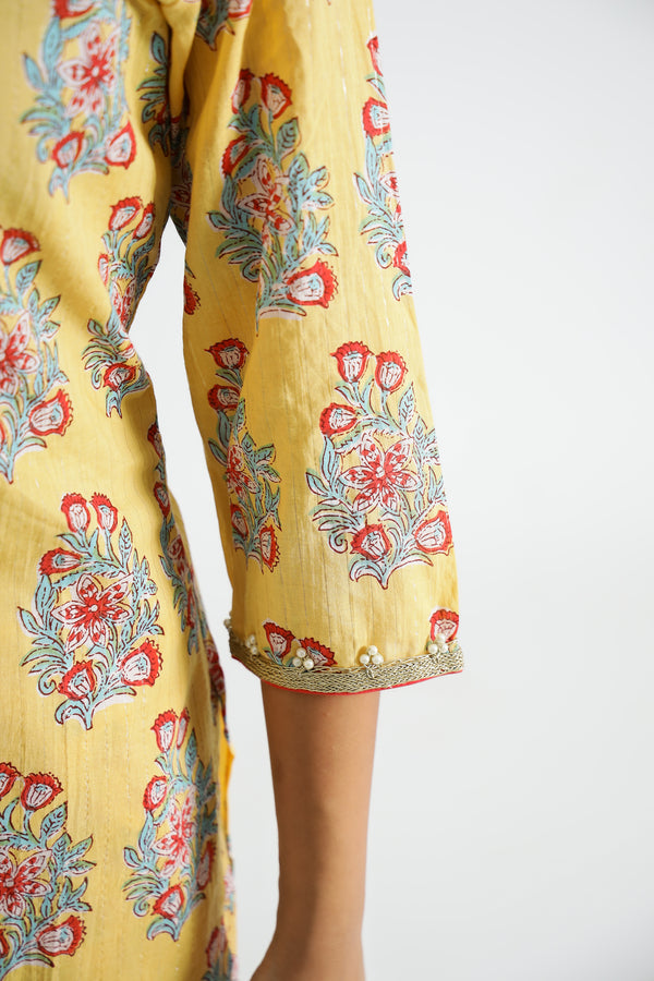 Woman Yellow Buta Kurti With Yellow Floral Salwar And Dupatta